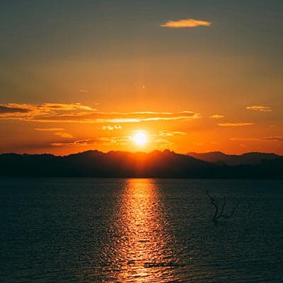 Sunset over calm landscape